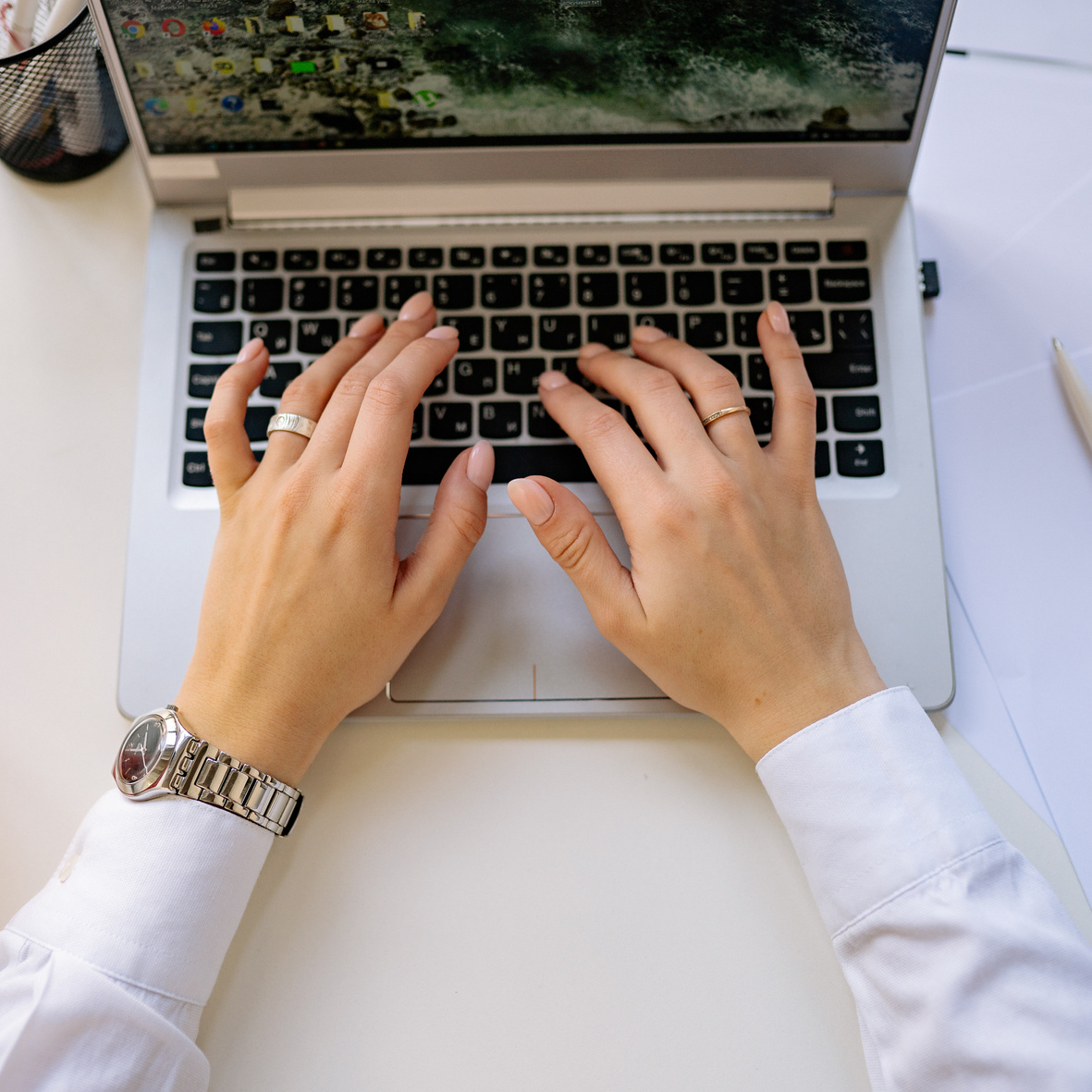 Person Typing on a Laptop